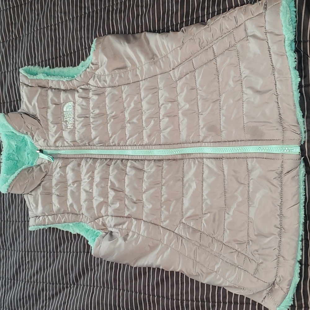 The North Face reversable puffer vest girls